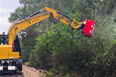 clearing land with mini excavator|mulch head for mini excavator.